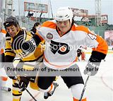 WALK IN THE 'PARK': Marco Sturm (left) fights for the puck with...